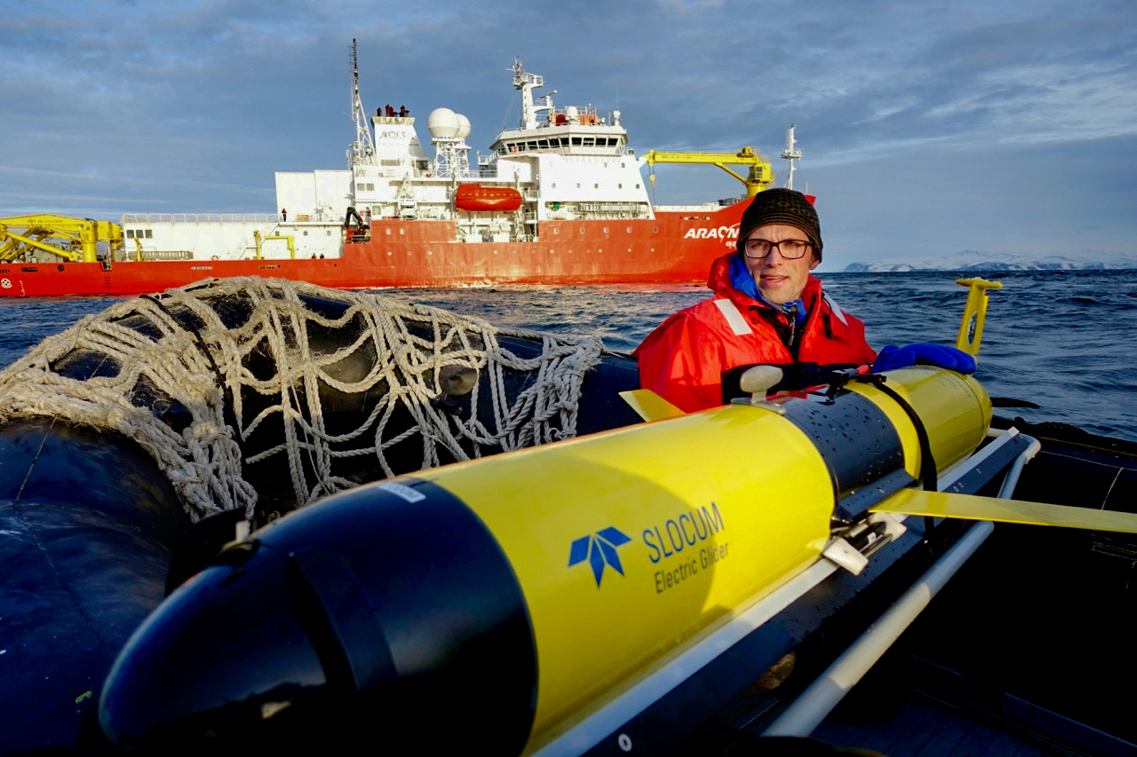 UC Davis engineering professor Alex Forrest with the recovered underwater glider after its seven-day mission diving in Terra Nova Bay, Antarctica.